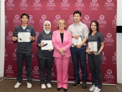 CDM Dean Elizabeth Andrews, DDS, MS, (center) with Delta Dental Endowed Scholarships for Opportunity recipients (left to right): Justin Lai, Layla Eltejaye, Jeong Hyun, and Katherine Vo. (Jeff Malet, WesternU)